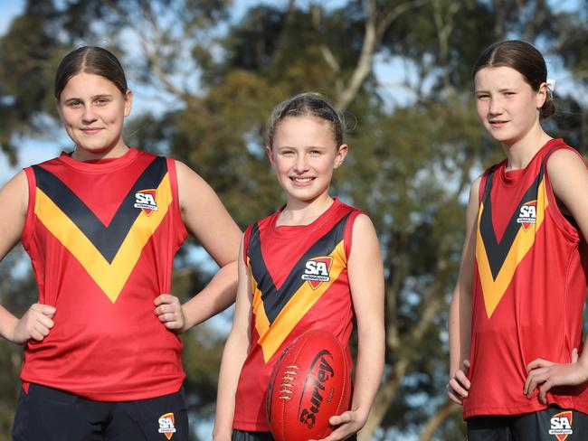 The School Sport Australia Under-12 Football Championships will be held in Adelaide and live streamed by The Advertiser from August 7-12. Members of the girls team, (LtoR) Scarlett Kelly, Jaiya Thornton, and Lara Gribbin, were at Golden Grove Football club for training. 29 July 2022. Picture Dean Martin