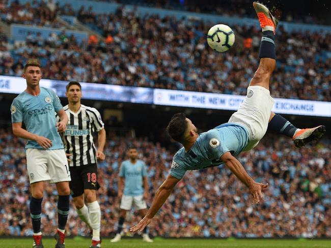 Manchester City's Argentinian striker Sergio Aguero attempts an overhead kick during the English Premier League football match between Manchester City and Newcastle United. Picture: AFP