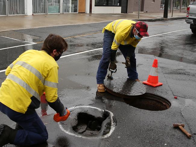 A sink hole on Myers St near the Haymarket carpark. Picture: Alison Wynd