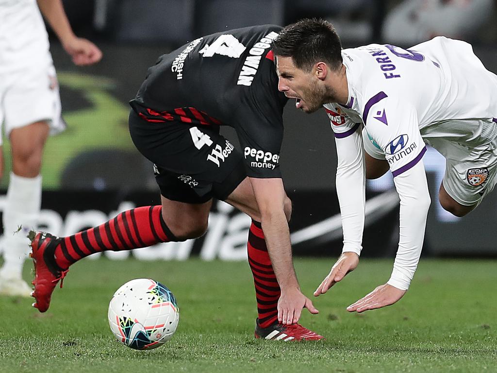 The Glory’s Bruno Fornaroli (right) is fouled by the Wanderers’ Dylan McGowan. Picture: Mark Metcalfe/Getty Images