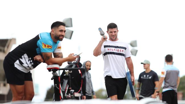 Sharks players grab fitness equipment after the shutdown to continue training while in isolation. Picture: Brett Costello