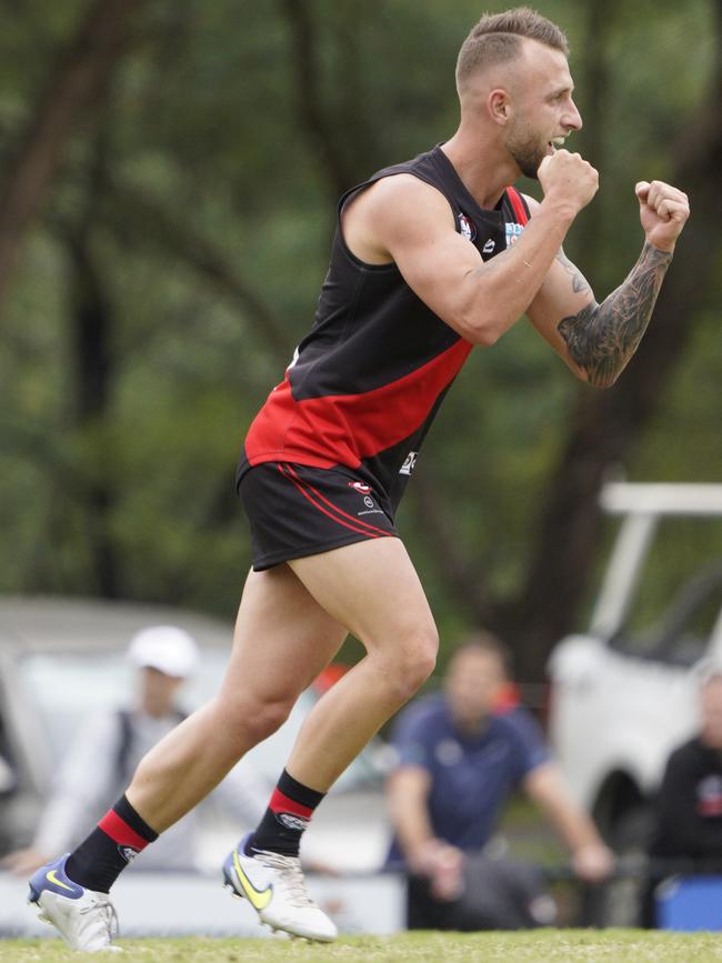 Nathan Perrone celebrates a goal for Eltham. Picture: Valeriu Campan