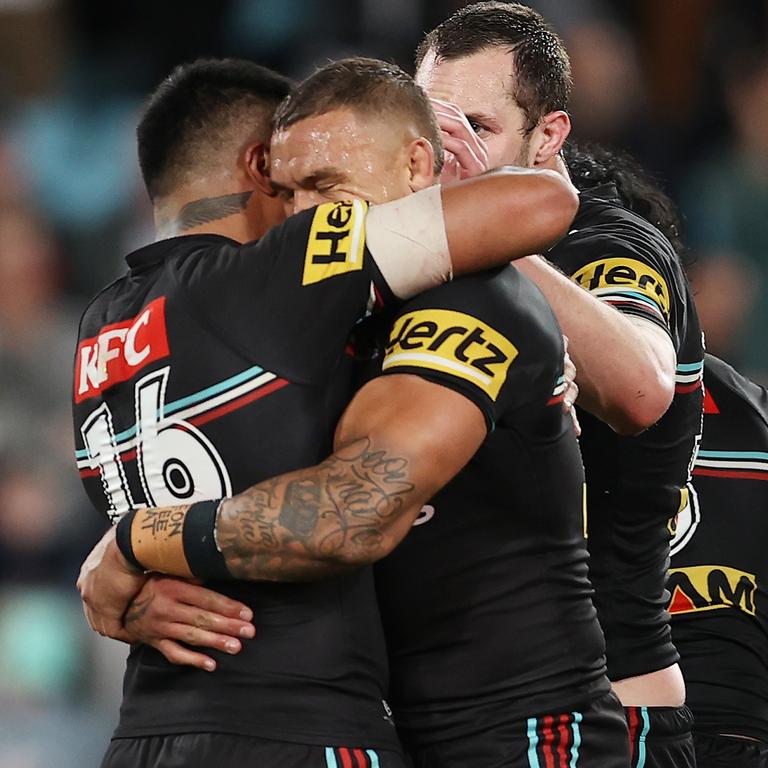 Spencer Leniu, James Fisher-Harris and Isaah Yeo celebrate making another grand final. Picture: Brendon Thorne/Getty Images