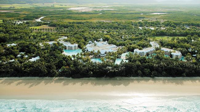 Lloyd Williams’ properties sit inside 130ha of tropical gardens alongside the Sheraton Grand Mirage Resort Port Douglas and next to Four Mile Beach (pictured).