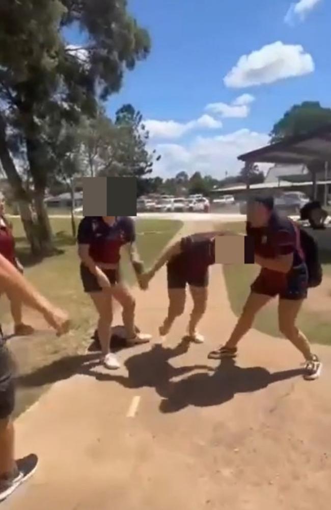 A Burnett mother has vowed to take legal action against a school where she claims teachers failed to intervene quickly enough in a fight that left her daughter requiring an ambulance.