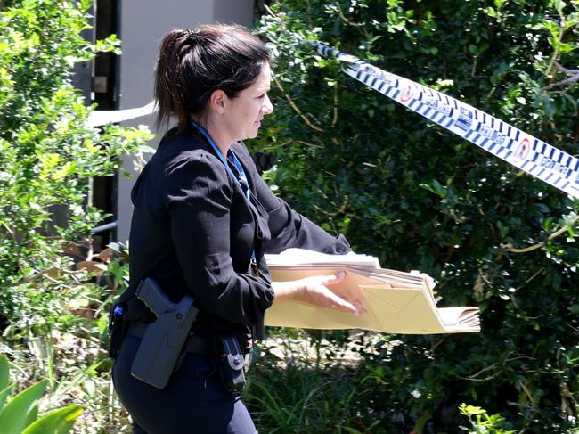 Police at the scene in Burpengary. Photo Steve Pohlner