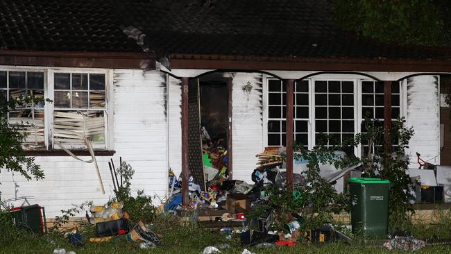 Firefighters had to smash through the window to gain entry into this NSW house to fight a fire because it was filled with hoarded rubbish and items. The male occupant, 73, died in the blaze. Hoarding expert Mike Kyrios said 25 per cent of fatal house fires involved hoarders.