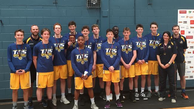 TGS Basketball’s Josiah Neal, coach Kabe Cicolini, Will Harmsworth, Joshua Ozegovic, Jason Spurgin, Ngaa Ngorima, Angus Scott, Joshua Allen, Peter Deng, Reid Capp, Greg Spurgin, Peter Geary and assistant coached Krystal Watson and Cameron Weber in 2018.