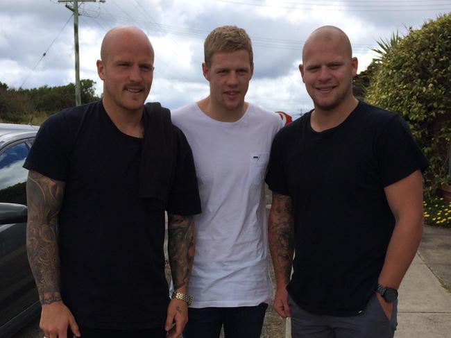 Zak (centre) with brothers Nathan (left) and Josh.