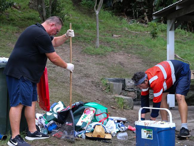 Local resident of Bronte Beach Robert Kokolich is seen helping the Council workers clean up the enormous amount of rubbish. Photo by: Gaye Gerard