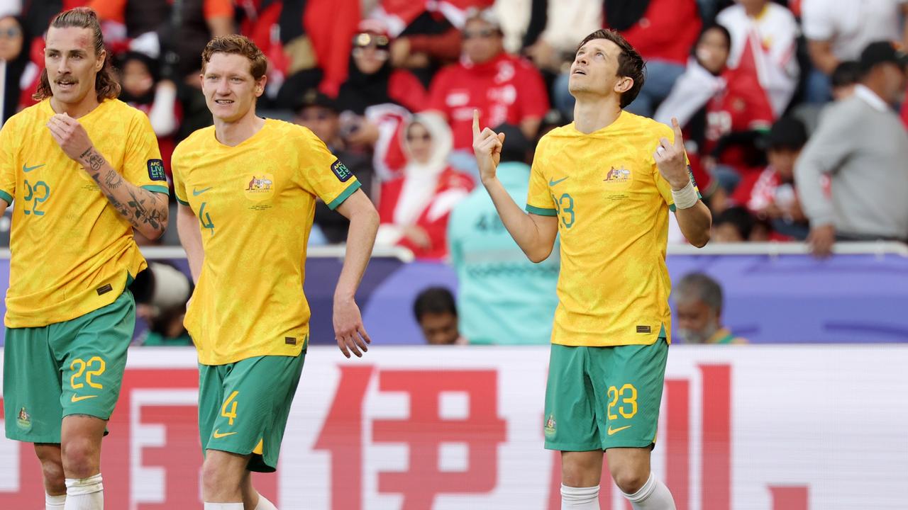 Craig Goodwin of Australia celebrates scoring his team's third goal during the AFC Asian Cup Round of 16 match between Australia and Indonesia at Jassim Bin Hamad Stadium on January 28, 2024 in Doha, Qatar. (Photo by Lintao Zhang/Getty Images)