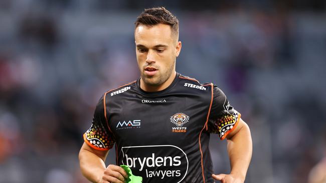 SYDNEY, AUSTRALIA - MARCH 12:  Luke Brooks of the Tigers runs during the warm-up before the round one NRL match between the Wests Tigers and the Melbourne Storm at CommBank Stadium, on March 12, 2022, in Sydney, Australia. (Photo by Mark Kolbe/Getty Images)