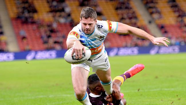 BRISBANE, AUSTRALIA - JUNE 27: Anthony Don of the Titans scores a try during the round seven NRL match between the Brisbane Broncos and the Gold Coast Titans at Suncorp Stadium on June 27, 2020 in Brisbane, Australia. (Photo by Bradley Kanaris/Getty Images)