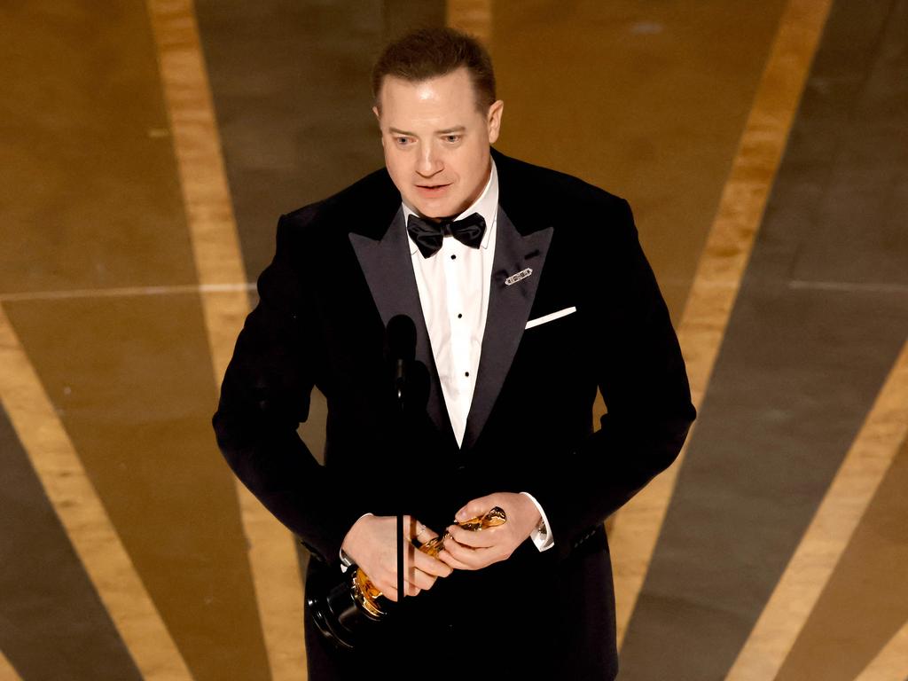 Brendan Fraser accepts the Best Actor award for The Whale. Picture: AFP