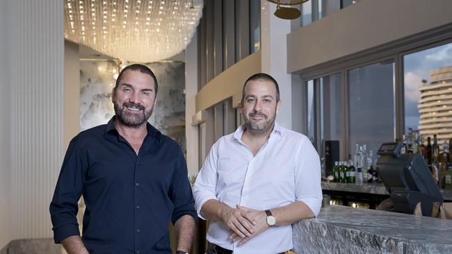 Billy Cross (left) and Simon Gloftis, The Star's venue partners in its swanky new Nineteen at The Star bar and restaurant on the rooftop of The Darling luxury suite hotel at Broadbeach. It was launched just prior to the Commonwealth Games and became an after-party magnet including hosting the Dolphins swim team privately.