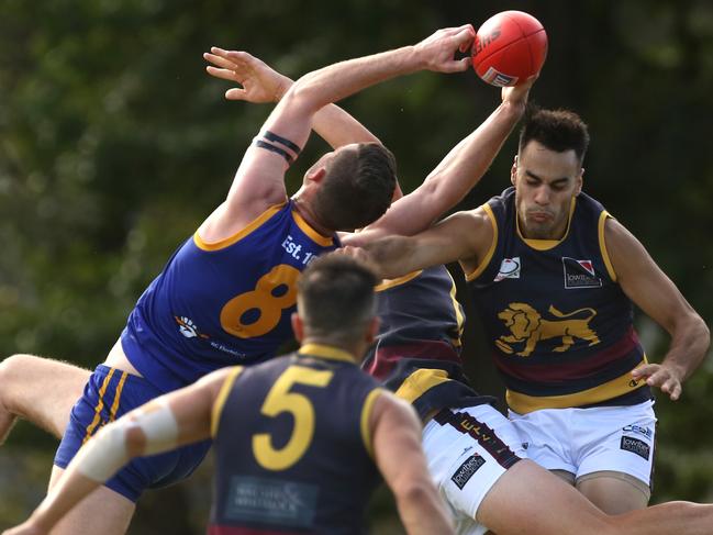 Joel Koger pulls in a strong mark for Lilydale in his debut game. Picture: Stuart Milligan