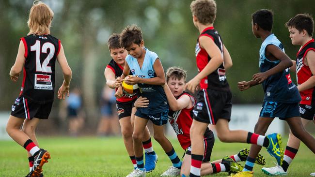 Under-10s compete in the first Darwin Buffaloes NTFL home against Southern Districts game at Woodroffe Oval. Picture: Pema Tamang Pakhrin