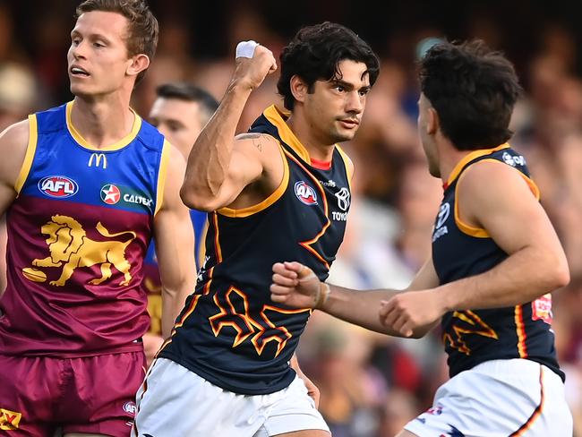 BRISBANE, AUSTRALIA - AUGUST 12: Shane McAdam of the Crows celebrates kicking a goal during the round 22 AFL match between the Brisbane Lions and Adelaide Crows at The Gabba, on August 12, 2023, in Brisbane, Australia. (Photo by Albert Perez/AFL Photos via Getty Images)