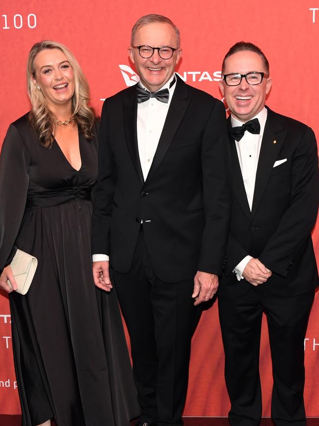 Anthony Albanese with fiancee Jodie Hayden and former Qantas CEO Alan Joyce in March 2023. Picture: James D Morgan/Getty Images