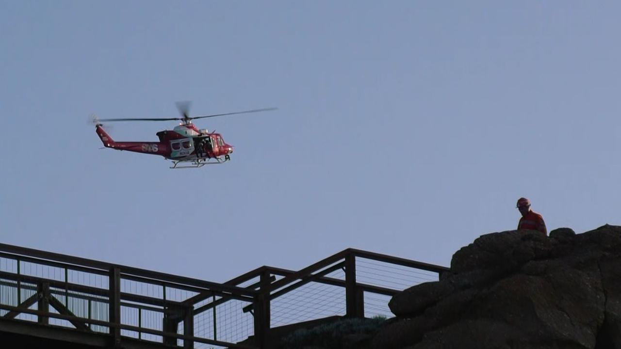 The scene of Granite Island as rescue choppers look for a missing teenager who has fallen from rocks. Picture: Gary Juleff