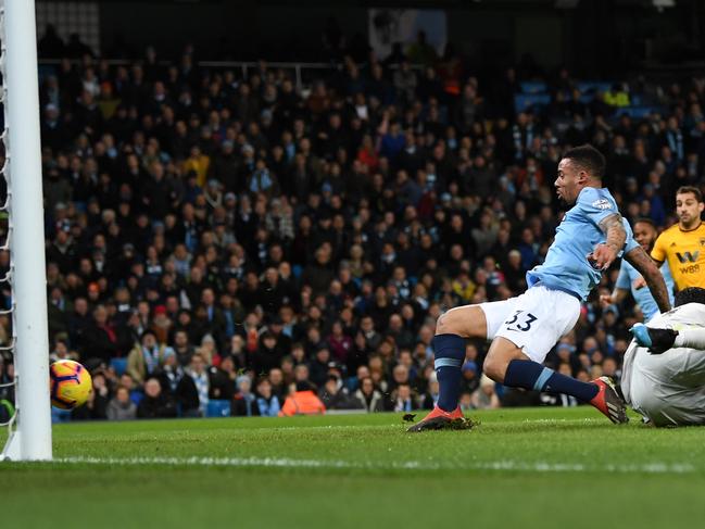 MANCHESTER, ENGLAND - JANUARY 14:  Gabriel Jesus of Manchester City scores his team's first goal during the Premier League match between Manchester City and Wolverhampton Wanderers at Etihad Stadium on January 14, 2019 in Manchester, United Kingdom.  (Photo by Michael Regan/Getty Images)