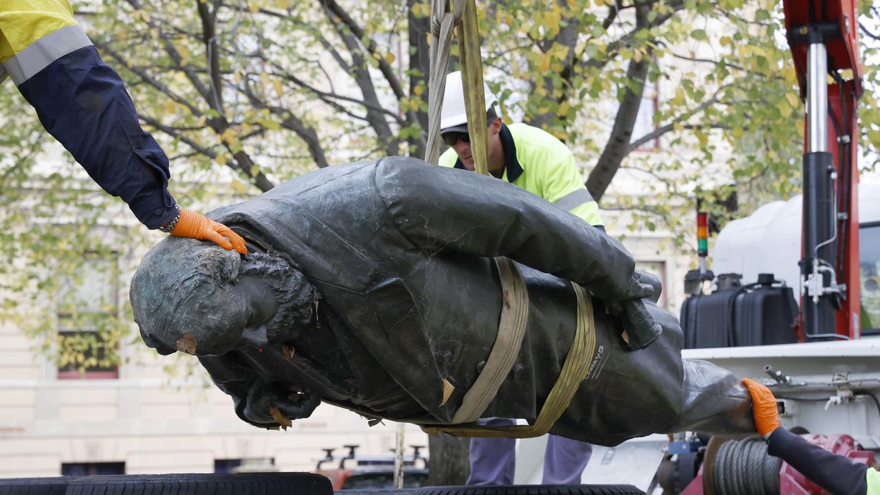 Council workers remove the statue. The William Crowther statue in Franklin Square Hobart has been vandalised overnight resulting in the statue being removed from it's plinth and then removed by Hobart City Council. Picture: Nikki Davis-Jones