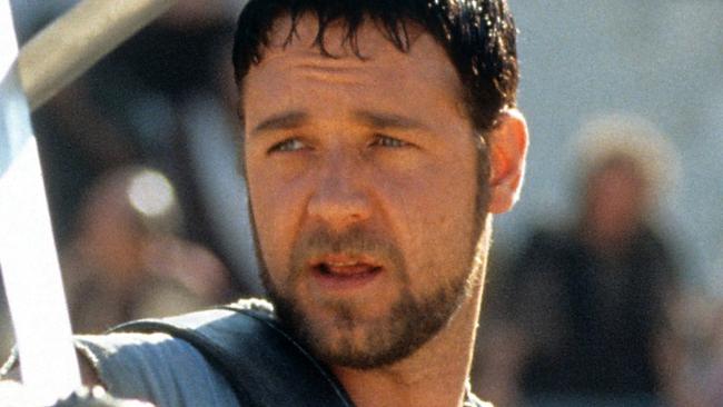 Russell Crowe facing off against another man in a scene from the film 'Gladiator', 2000. (Photo by Universal/Getty Images)