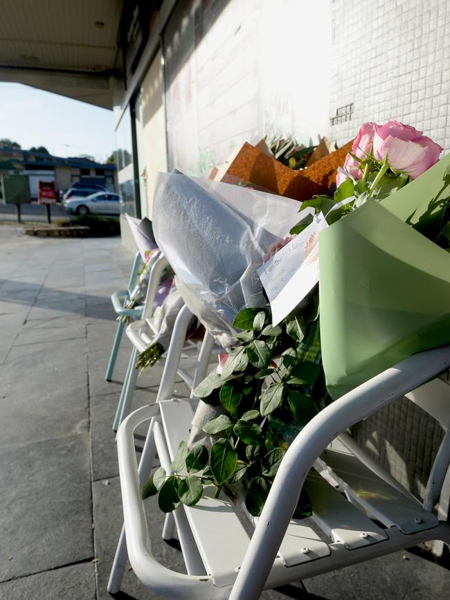 Flowers left as a memorial at the site where Liz Albornoz died after a car ploughed into a cafe she was dining at in North Epping. Photo: Jeremy Piper