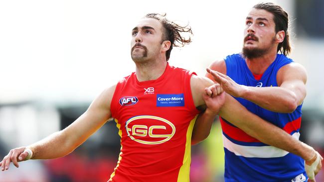 Clarkson says junior stars like Tom Boyd (right) find it far tougher in the AFL. Pic: Getty Images