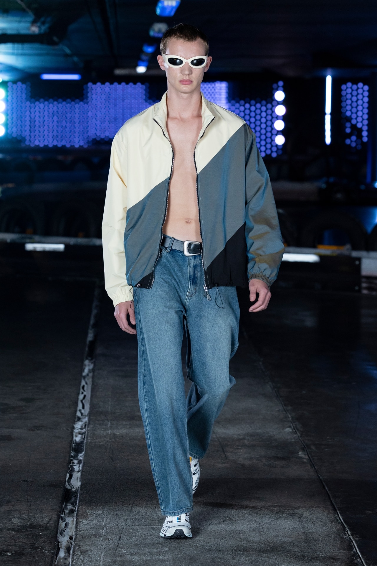 <p>Echoed again at Wynn Hamlyn, the rave-ready uniform was matched with baggy stonewashed jeans in menswear and the unofficial club-shoe of Generation Z—the Salomon XT-6. Where Verner the crinkled finish of the material was more downplayed, at <a href="https://www.vogue.com.au/fashion/news/wynn-hamlyn-aafw-2023/news-story/25f330956160ef4143e7e52996dcaad1" target="_blank" rel="noopener">revved-up Wynn Hamlyn</a> there was a glowing metallic sheen giving that extra edge to the jacket.</p>