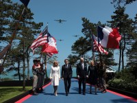 COLLEVILLE-SUR-MER, FRANCE - JUNE 06: U.S. President Joe Biden and first lady Jill Biden walk with French President Emmanuel Macron and his wife Brigitte Macron while arriving at a ceremony marking the 80th anniversary of D-Day at the Normandy American Cemetery on June 06, 2024 in Colleville-sur-Mer, France. Veterans, families, political leaders and military personnel are gathering in Normandy to commemorate D-Day, which paved the way for the Allied victory over Germany in World War II. (Photo by Win McNamee/Getty Images) *** BESTPIX ***