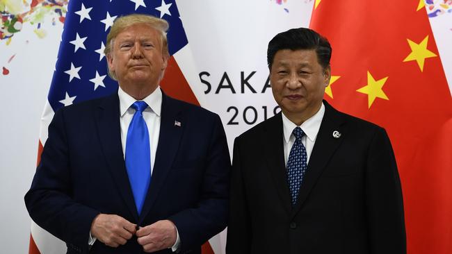 Chinese President Xi Jinping (R) and US President Donald Trump attend their bilateral meeting on the sidelines of the G20 Summit in Osaka.