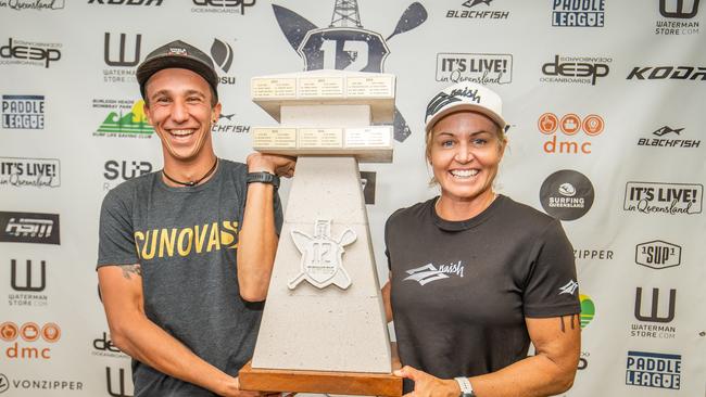 Noic Garioud and Karla Gilbert show off the 12 Towers trophy after wins in the long course race. Photo by Georgia Schofield/ 12 Towers