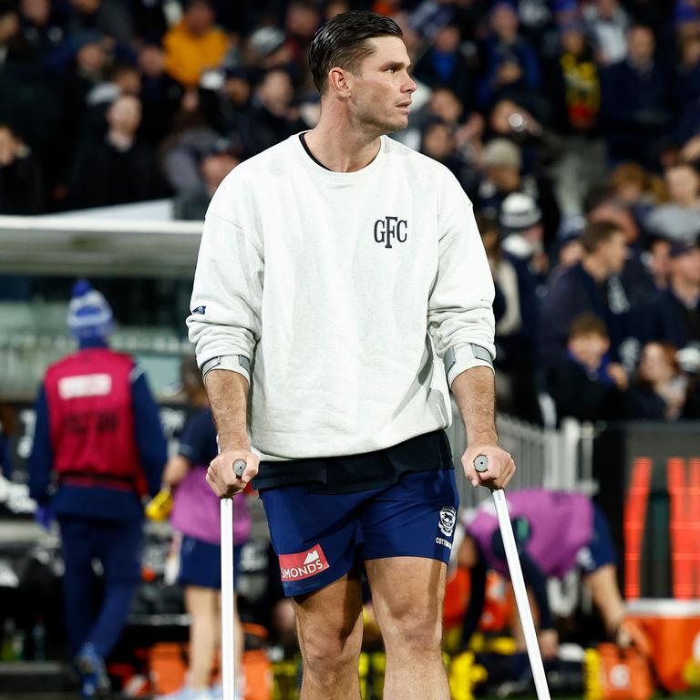 Tom Hawkins reappeared on crutches after disappearing down the race with a foot issue during the third quarter of Geelong’s loss to Carlton. Picture: Michael Willson / Getty Images