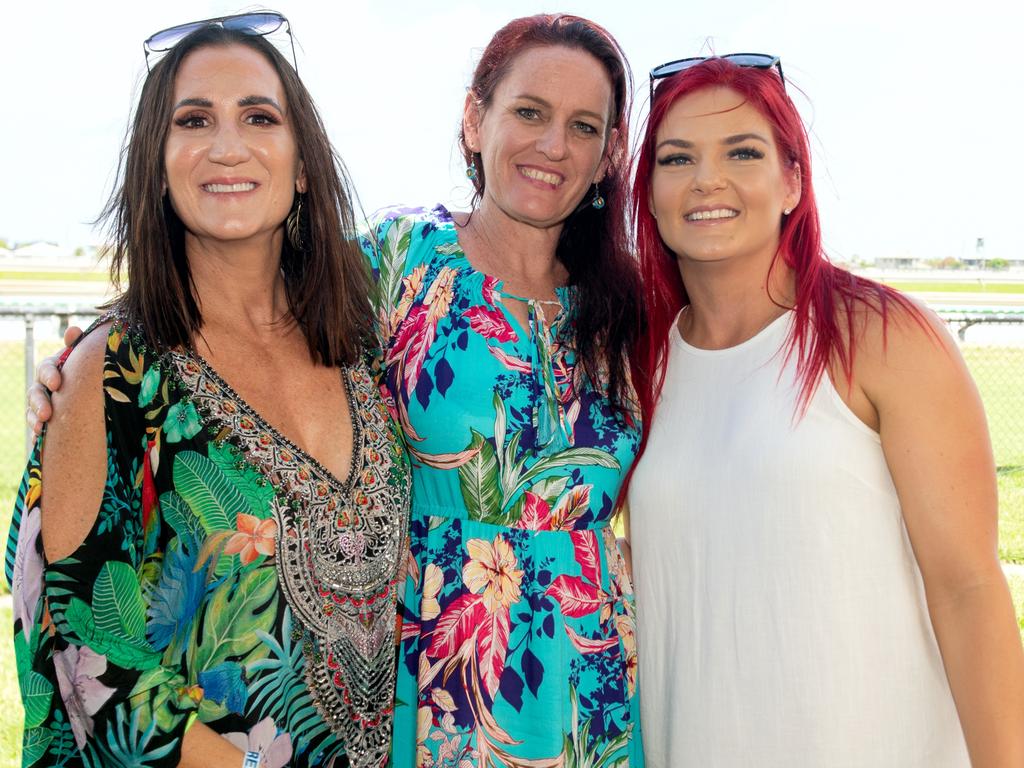Katrina Borg and Amalie Draper from Blacks Beach and Bryony Robinson from Walkerston at the Hawaiian Christmas Race Day. Mackay Turf Club, Ooralea. Picture: Michaela Harlow