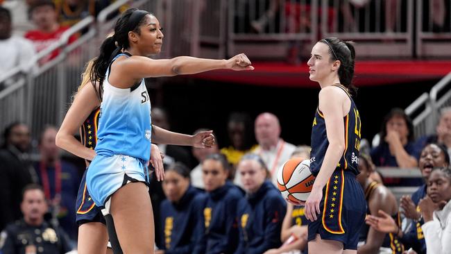 Reese (left) reacts after fouling Clark again later in the game. (Photo by Emilee Chinn/Getty Images)