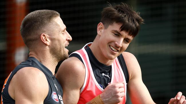 GWS star defender Sam Taylor (right) will return after he suffered a horror ruptured testicle in round 14 which sidelined him for six weeks. Picture: Phil Hillyard