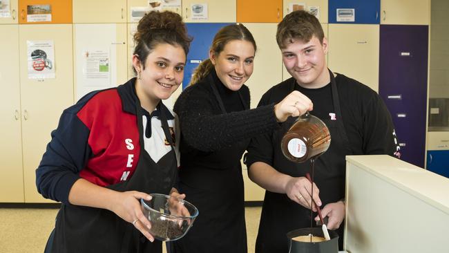 BEHIND THE SCENES: Preparing for their first restaurant project assessment piece are Toowoomba State High School students (from left) Ella Saunders, Allie Pateman and Max Pritchard. Picture: Kevin Farmer