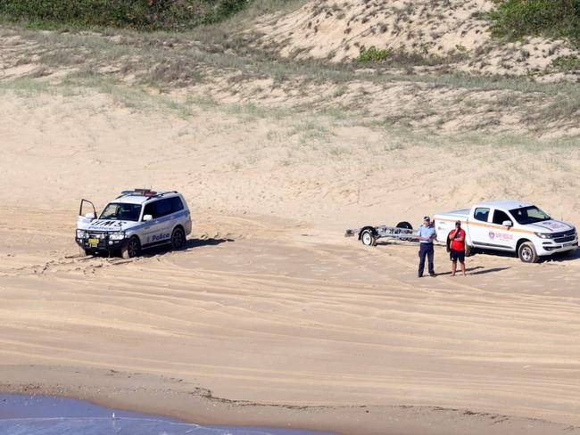 Investigators on the sand at Scotts Head Beach. Picture: Supplied