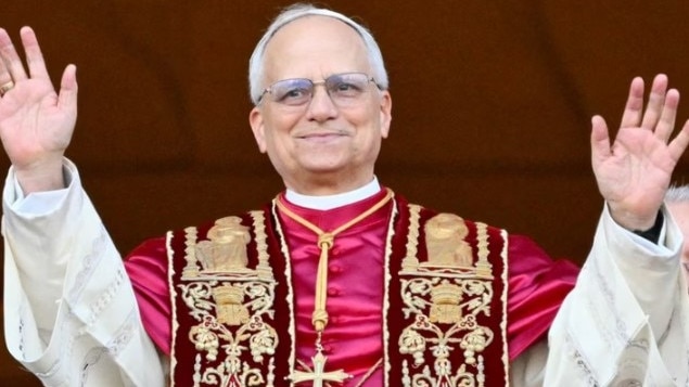 Newly elected Pope Leo XIV arrives on the main central loggia balcony of St. Peter’s Basilica for the first time, after the cardinals ended the conclave, in the Vatican, on May 8, 2025. Picture: Alberto Pizzoli/Getty Images