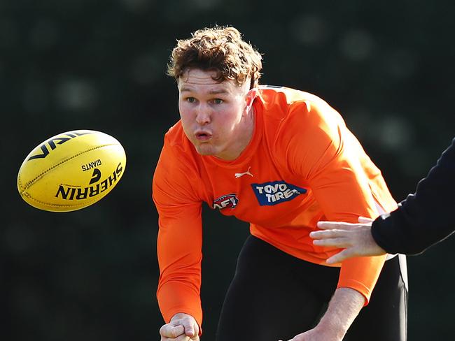 Giants Tom Green with coach Adam Kingsley during the GWS Giants training session at VAILO Community Centre, Homebush on July 2, 2024.. Photo by Brett Costello(Image Supplied for Editorial Use only - **NO ON SALES** - Â©Brett Costello )