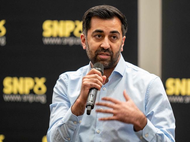 (FILES) In this file photo taken on March 11, 2023 Contender to become the leader of the Scottish National Party (SNP), Scotland's Health Minister and SNP MSP Humza Yousaf speaks during a SNP leadership hustings in at the University of Strathclyde in Glasgow. - Yousaf, 37, has been endorsed by more MSPs and MPs than his two rivals and is considered the frontrunner and preferred candidate to succeed Nicola Sturgeon. (Photo by Jane Barlow / POOL / AFP)