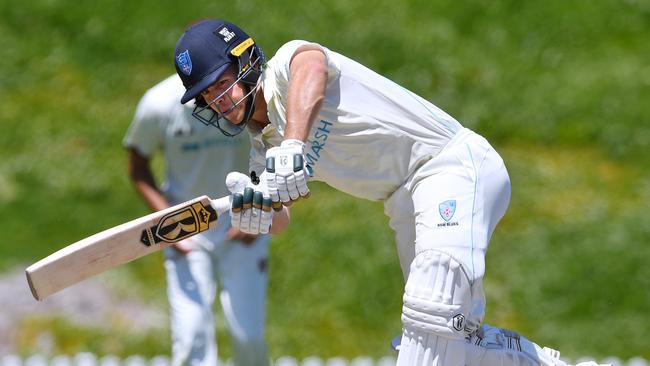 Daniel Solway bats in the match between NSW and Queensland.