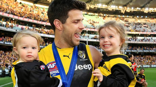 Cotchin celebrating the Tigers 2017 Premiership win with his daughters. Picture: Mark Stewart