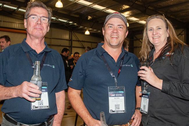 Tom Hovatta, Ian Jinks and Shelly Flook from Brisbane at the QME Mackay 2022 Opening Party in conjunction with Queensland Resources Council sponsored by Hastings Deering. Picture: Michaela Harlow