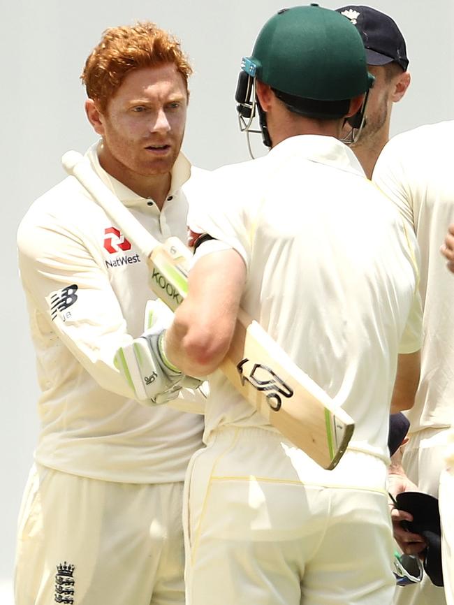 Jonny Bairstow shakes hands with Cameron Bancroft.