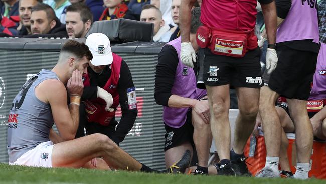 Scott Lycett gets treatment on the boundary after clashing with Josh Jenkins. Picture: Sarah Reed