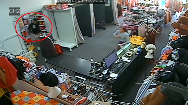 Watch: Terrifying moment fugitive fleeing cops locks himself in QLD costume shop