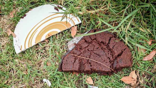 A chocolate cake at the scene where Mr Jonuzi was found. Picture: Jake Nowakowski