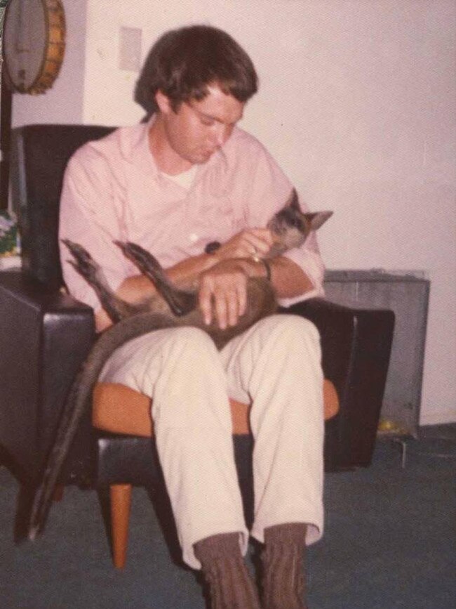 Conservation biologist and UNSW professor Michael Archer with his pet wallaby.